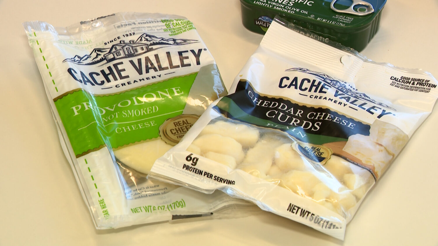 Bags of cheese and cheese curds, and a tin of sardines. Whole-food snacks like these can help kids stay energized throughout the school day, Allison Christy of Select Health said to KSL-TV Thursday.