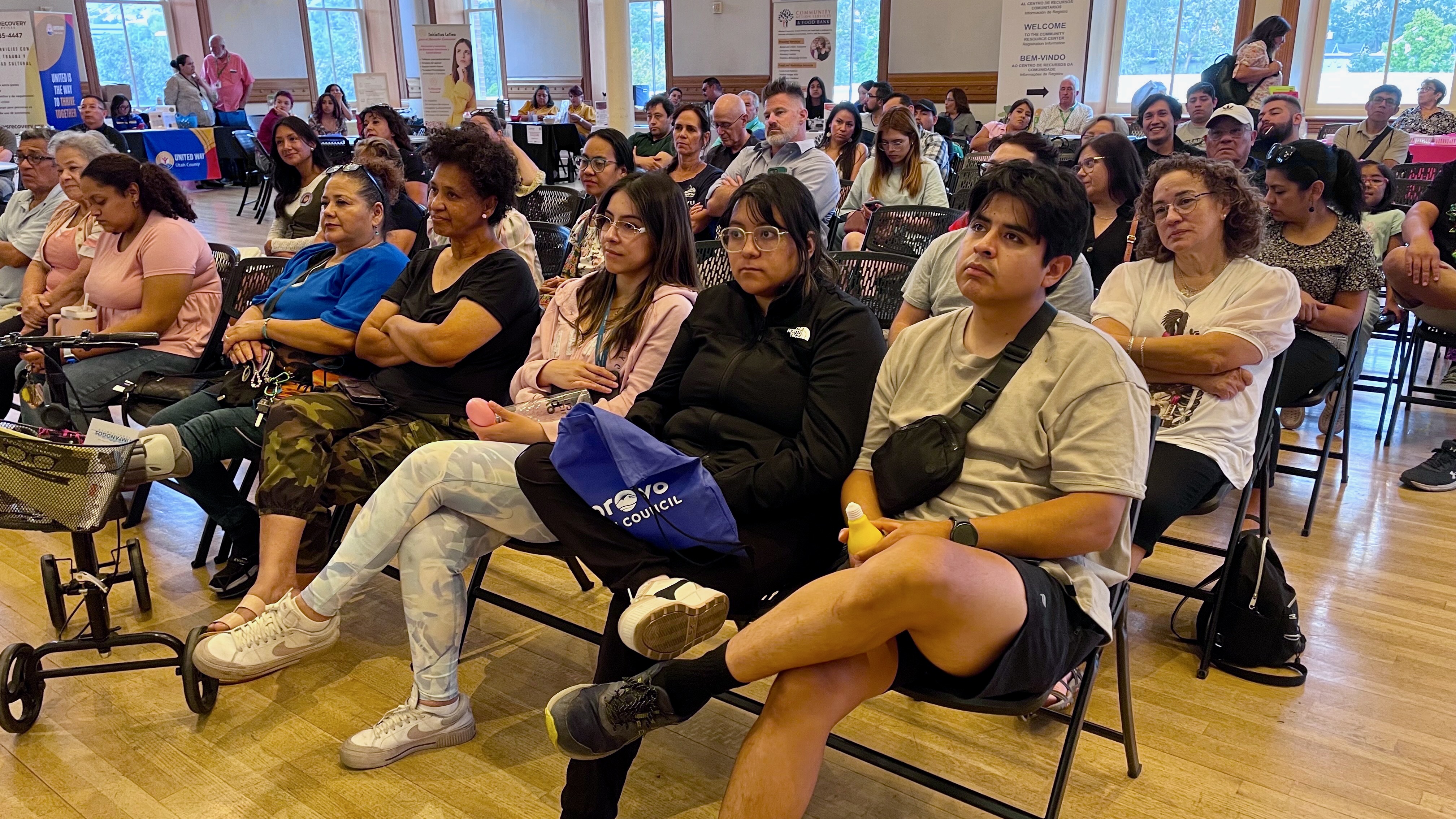 Latinos are increasingly pessimistic and critical of Trump's immigration policies, a new survey shows. The Aug. 7 photo shows a gathering at the Provo City Library called to encourage involvement among the city's Latino population.