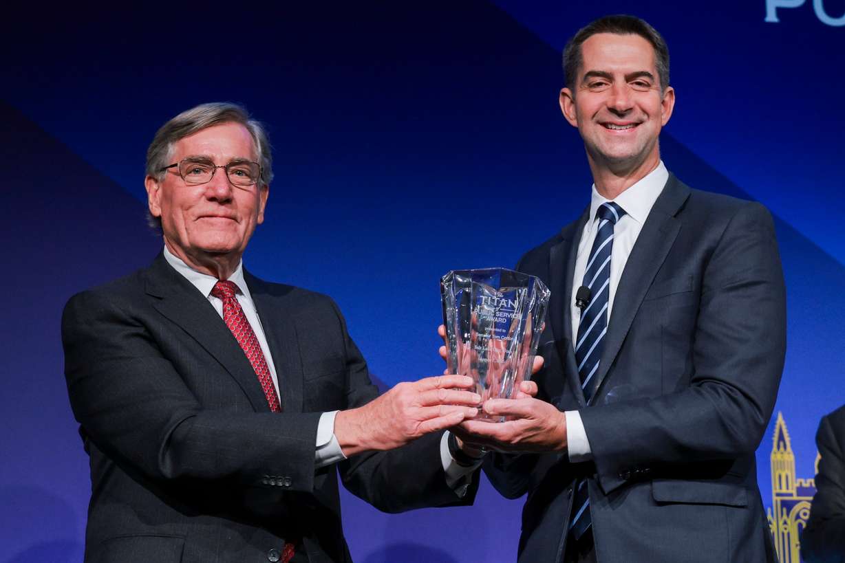Orrin G. Hatch Foundation Board Chairman A. Scott Anderson presents Arkansas Sen. Tom Cotton with the Titan of Public Service Award at Salt Lake City's Grand America on Thursday. Cotton was selected for his respectful dialogue and commitment to service.