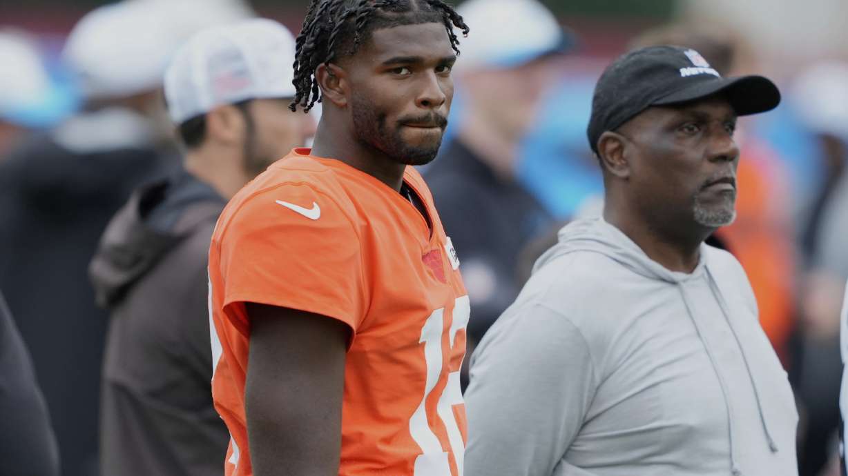 Cleveland Browns quarterback Shedeur Sanders watches during an NFL football dual training camp with Carolina Panthers Wednesday, Aug. 6, 2025, in Charlotte, N.C.