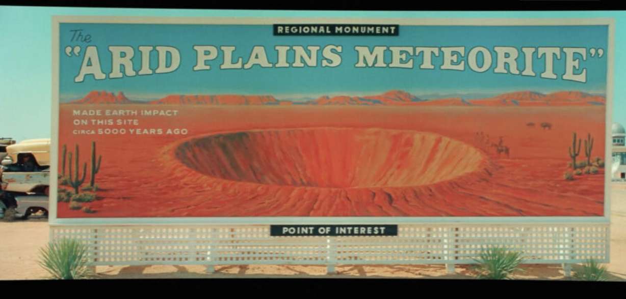 A billboard featured in the Wes Anderson film "Asteroid City." Utahn David Meikle painted the image used on this billboard featured in the film.
