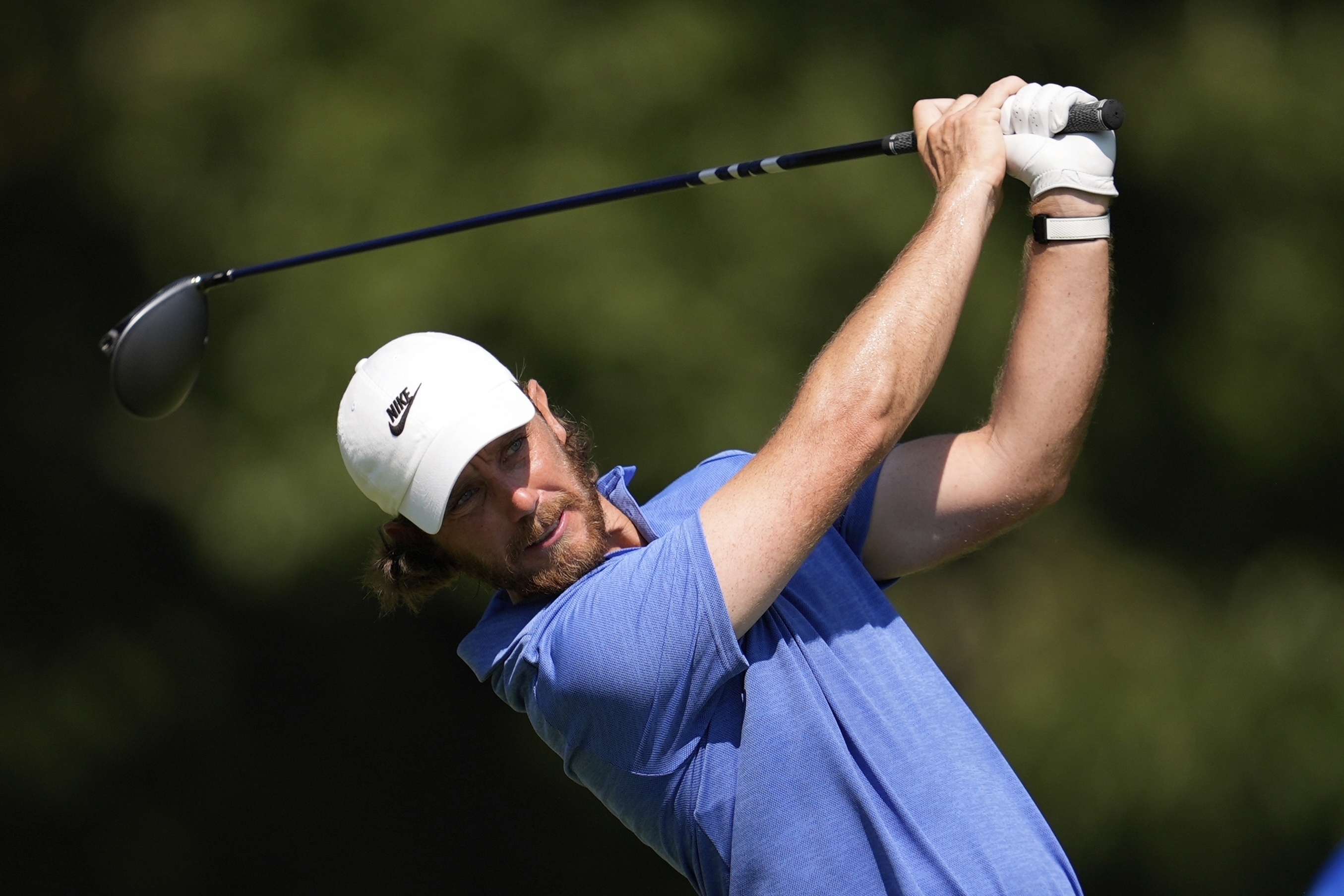 Tommy Fleetwood, of England, watches his tee shot on the seventh hole during the second round of the St. Jude Championship golf tournament Friday, Aug. 8, 2025, in Memphis, Tenn.