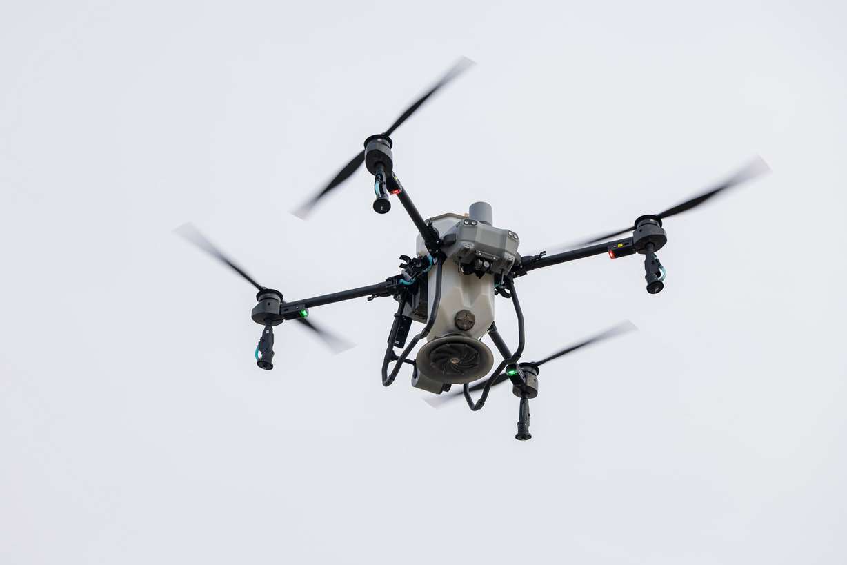 A drone touches down after spraying Natular G30 over the wetland habitats near the Salt Lake City International Airport on Friday. The presence of West Nile virus is increasing, but no human cases have been reported yet.