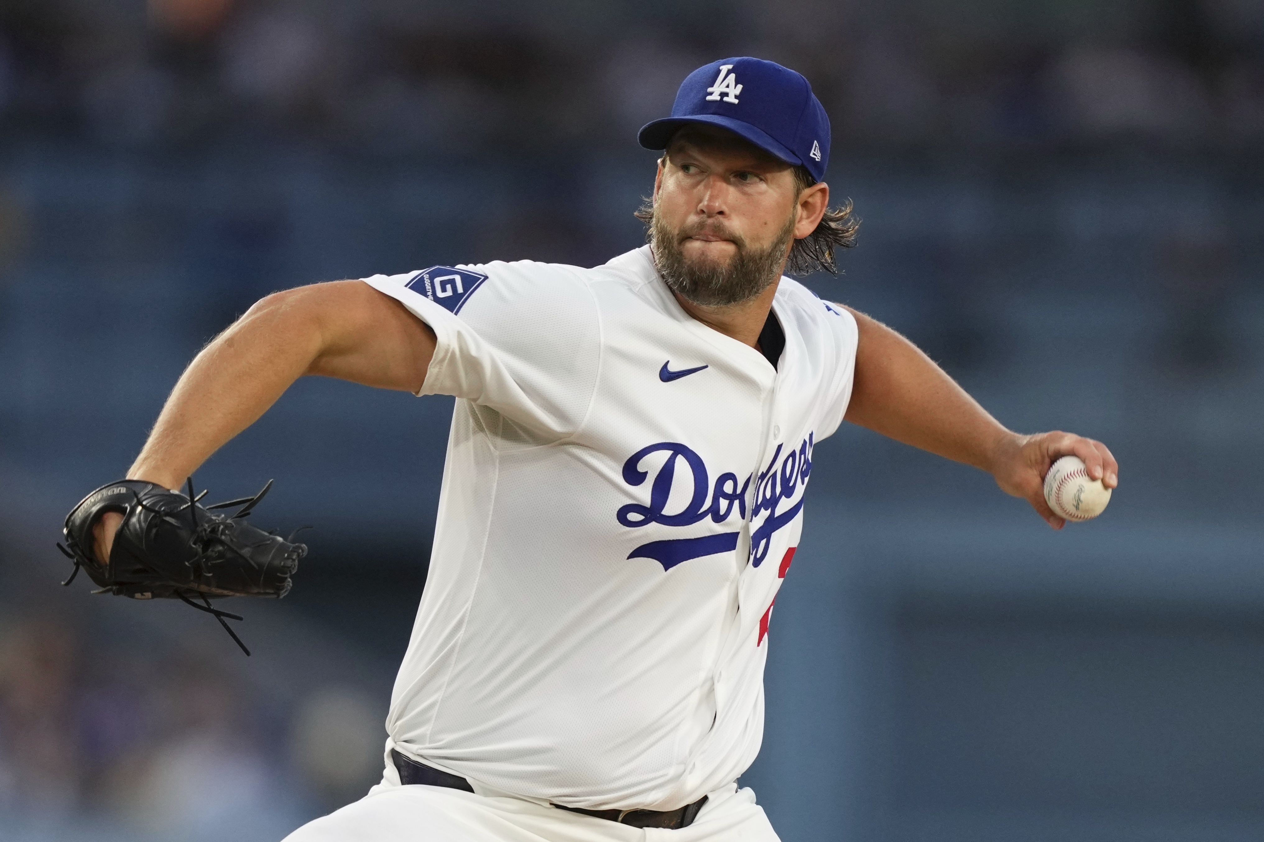 Los Angeles Dodgers starting pitcher Clayton Kershaw throws to the plate during the second inning of a baseball game against the Toronto Blue Jays, Friday, Aug. 8, 2025, in Los Angeles.