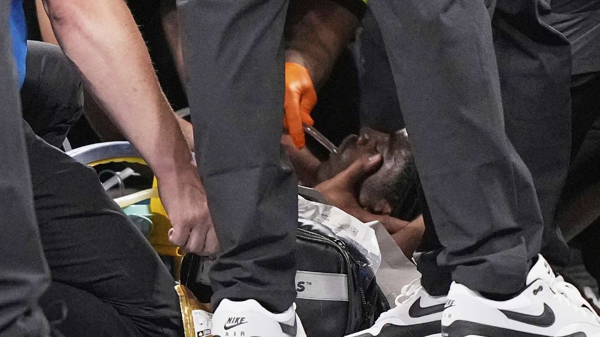 Medical personnel attend to Detroit Lions safety Morice Norris after being injured against the Atlanta Falcons during the second half of an NFL preseason football game Friday, Aug. 8, 2025, in Atlanta.