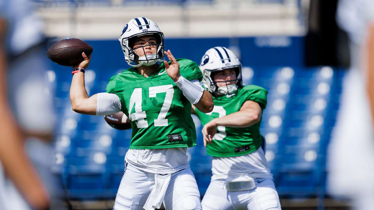 BYU quarterbacks Bear Bachmeier (47) and McCae Hillstead (3) warm up prior to a scrimmage at LaVell Edwards Stadium, Saturday, Aug. 9, 2025 in Provo, Utah.