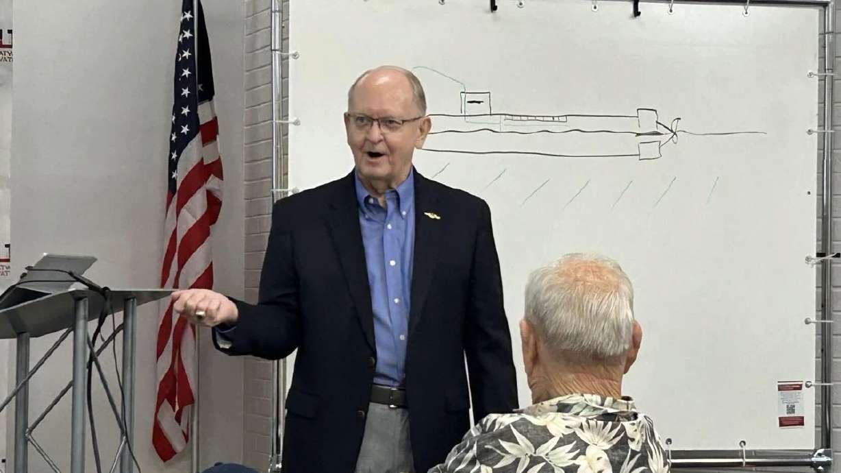 Tim Martin presents information about the new USS Utah submarine at the Utah Tech Innovation Plaza in St. George, Wednesday. The new submarine is to be christened Oct. 25 in Groton, Connecticut.
