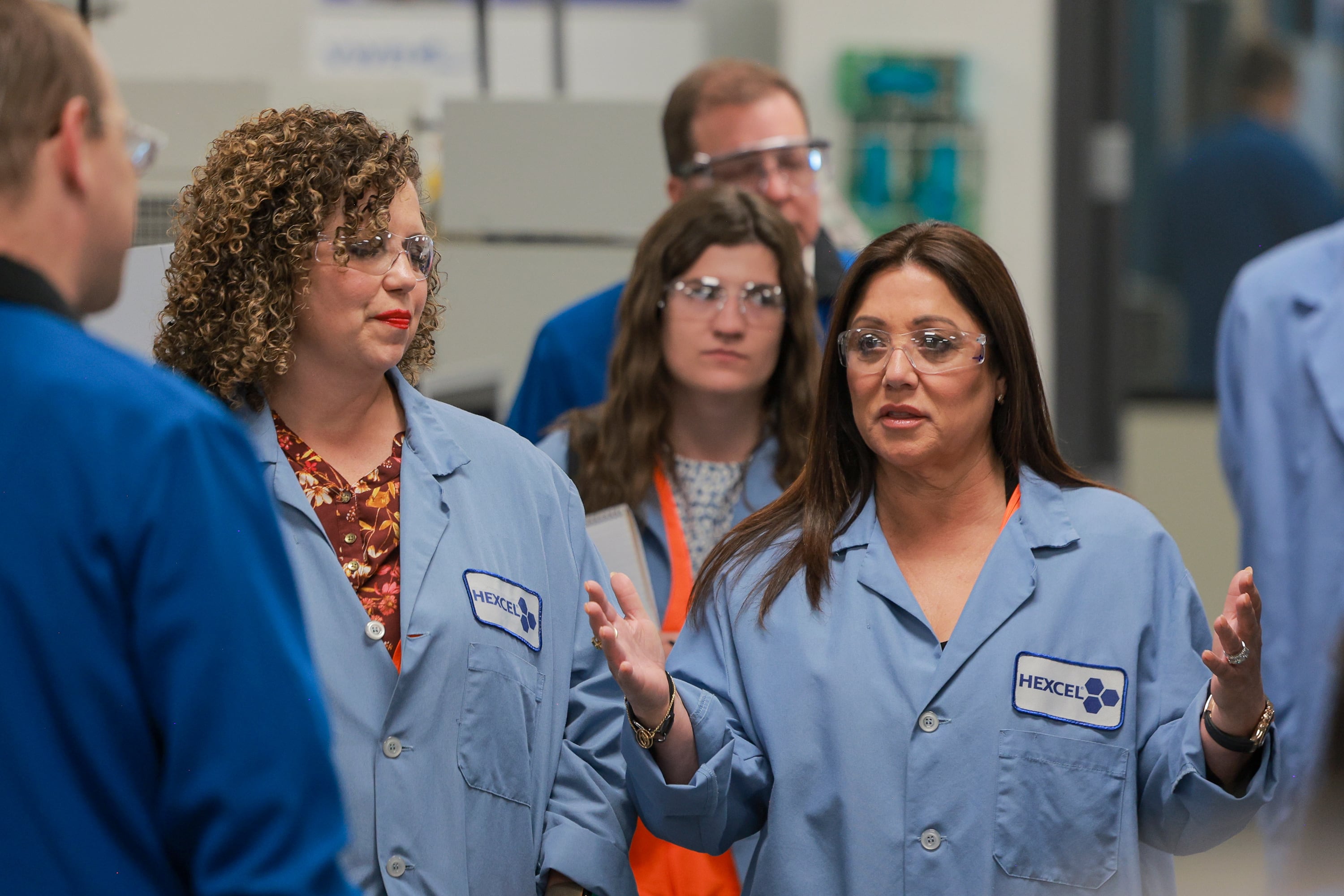 U.S. Secretary of Labor Lori Chavez-DeRemer, right, speaks with workers during a tour of Hexcel’s facilities in West Valley City on Friday. Rep. Celeste Maloy is on her left.