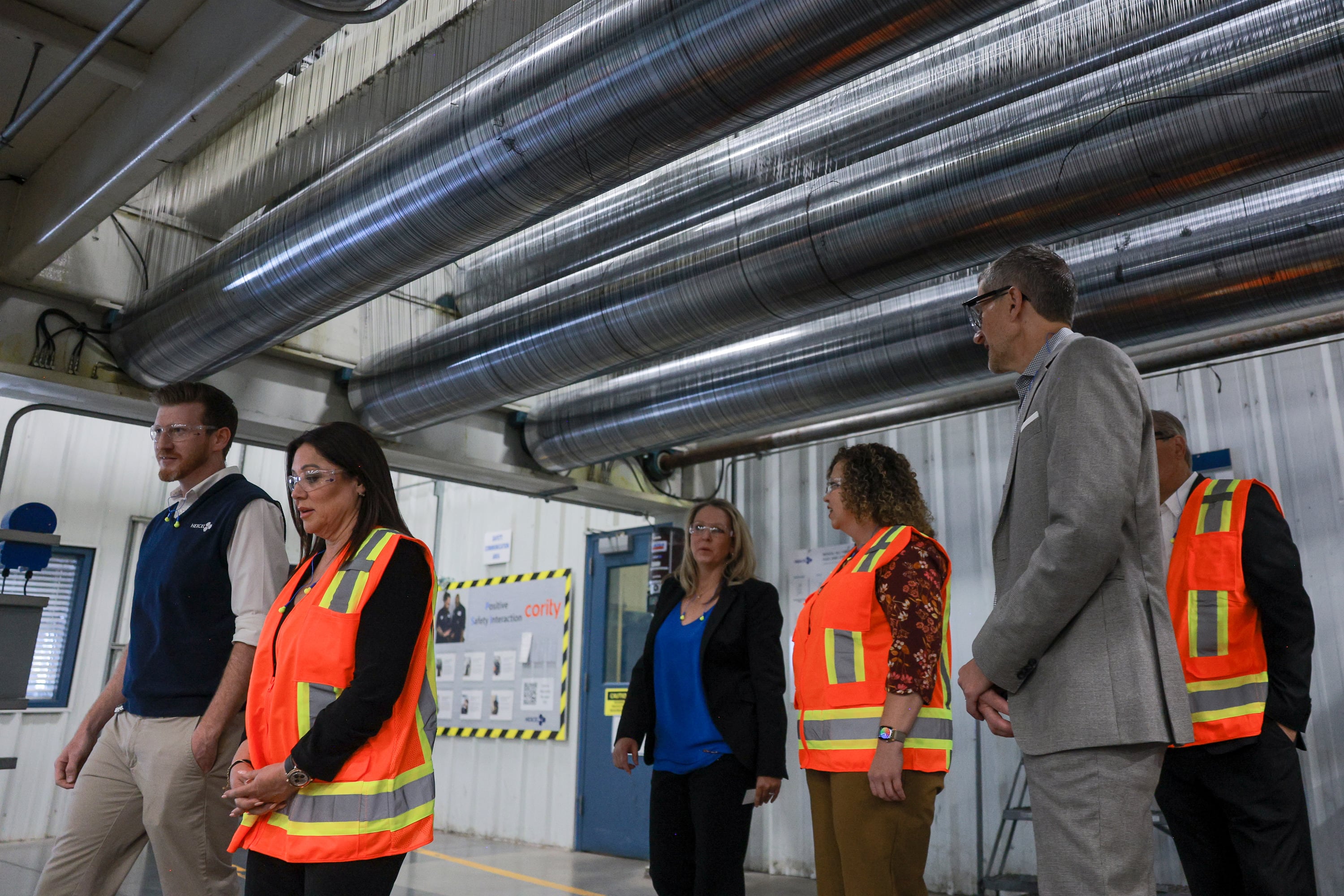 U.S. Secretary of Labor Lori Chavez-DeRemer, second from left, talks with Drew Patterson, plant manager for fibers, left, during a tour of Hexcel’s facilities in West Valley City on Friday.