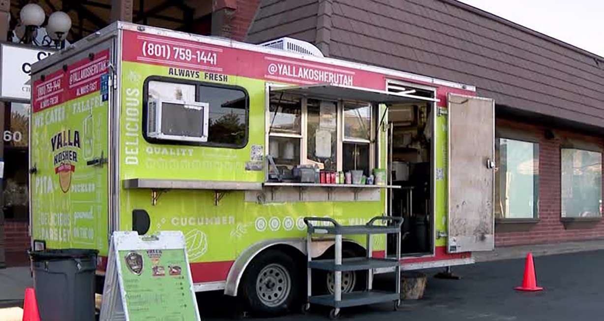 The operator of the Yalla Kosher food truck, parked at 1100 East and Wilson Avenue in Sugar House Sunday, says they run a 200-foot copper wire through a parking lot to power the truck. The power source has been stolen twice, he said.
