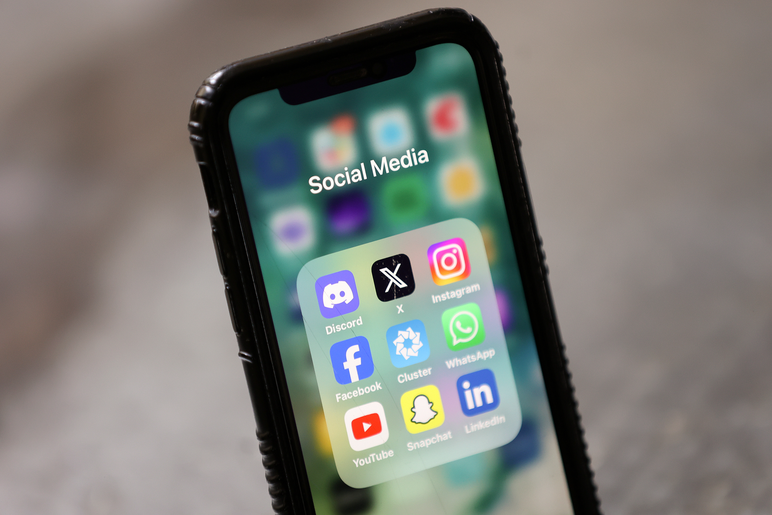 An Orem woman who was arrested after trying to shoot her cellphone with her boyfriend's gun has been sentenced to probation for recklessly discharging a firearm.