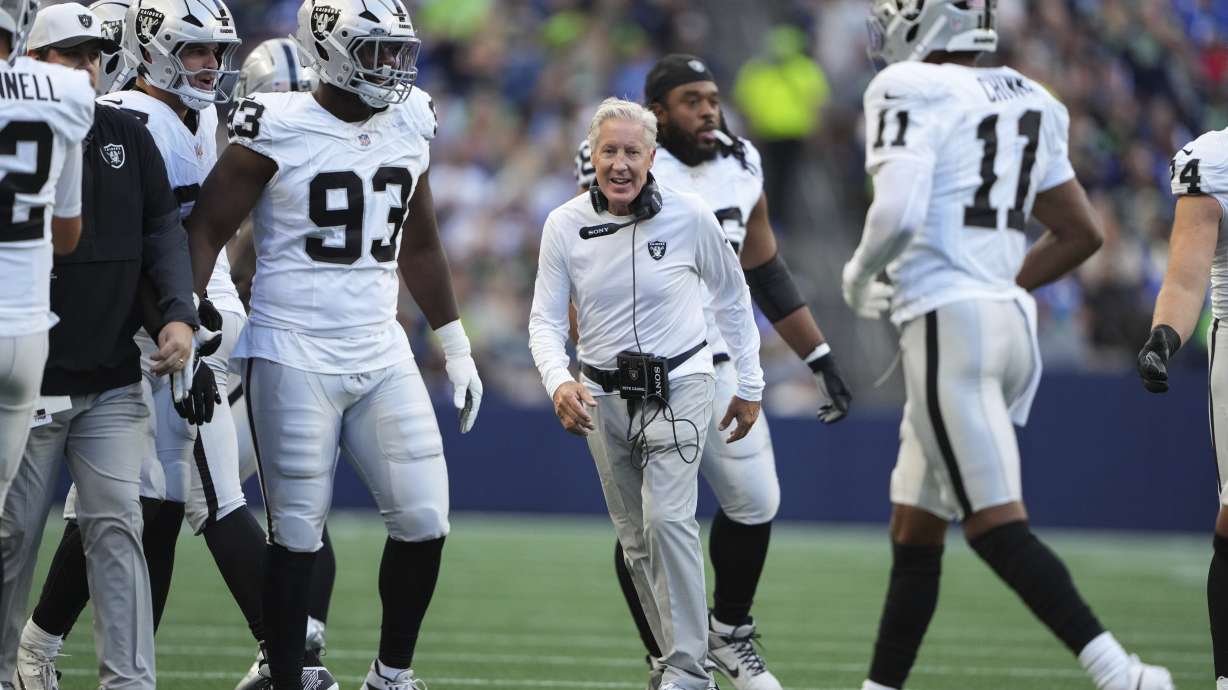 Las Vegas Raiders head coach Pete Carroll reacts after an interception by the Raiders during the first half of an NFL preseason football game against the Seattle Seahawks, Thursday, Aug. 7, 2025, in Seattle.