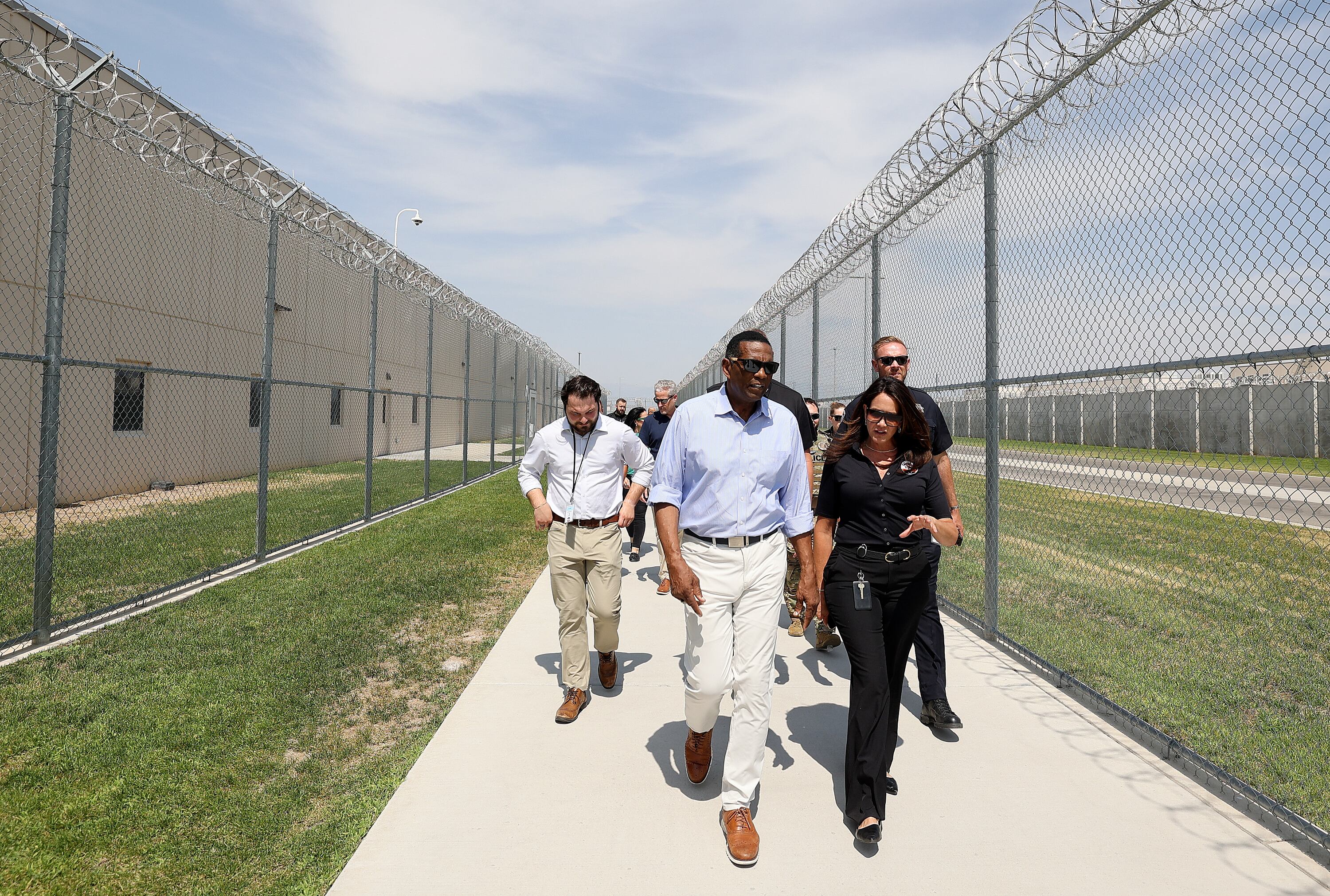 Rep. Burgess Owens, R-Utah, talks with Rebecca Brown, Utah Department of Corrections deputy executive director, while touring the Utah State Correctional Facility in Salt Lake City, Aug. 4.