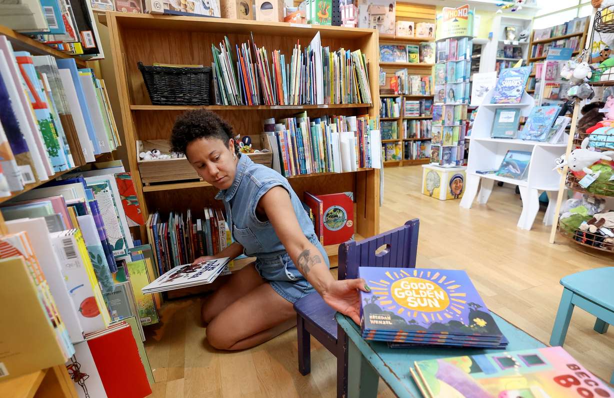 Alexis Powell shelves books in the children’s room at The King’s English Bookshop in Salt Lake City on July 22. Co-owner Calvin Crosby says the "magic" of the store calls to people.