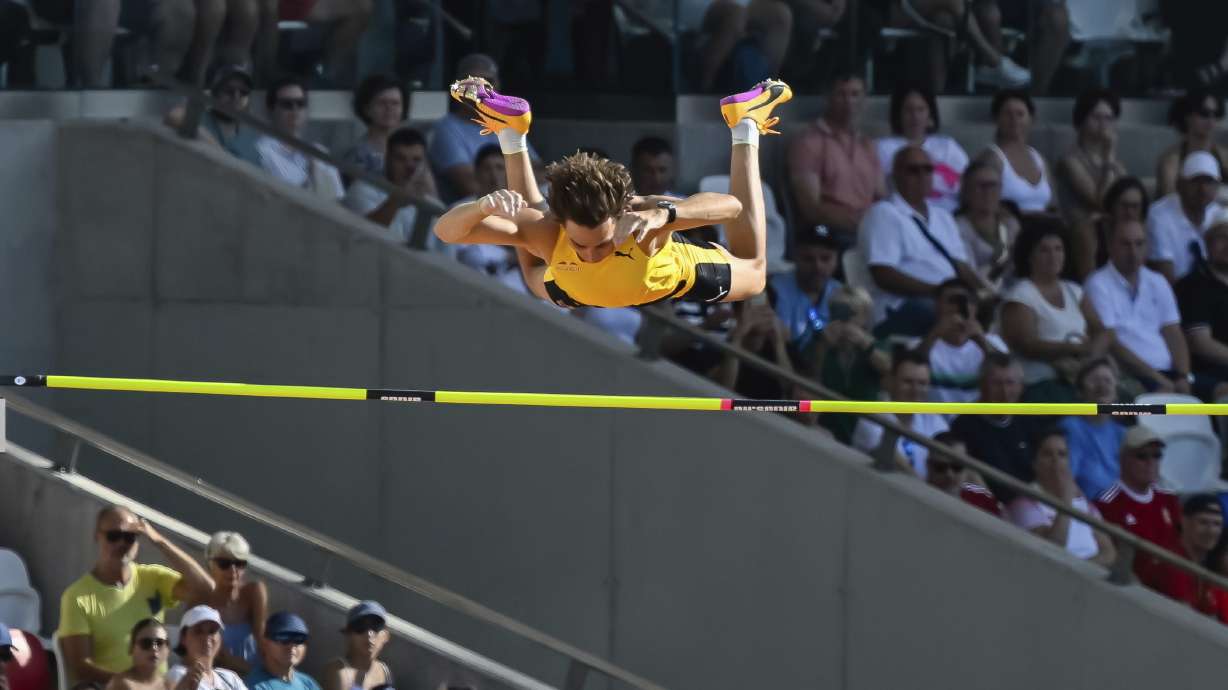 Armand Duplantis, of Sweden, competes in the final of the men's pole vault at the 15th Gyulai Istvan Memorial Track and Field Hungarian Grand Prix in the National Athletics Center in Budapest, Hungary, Tuesday, Aug. 12, 2025.