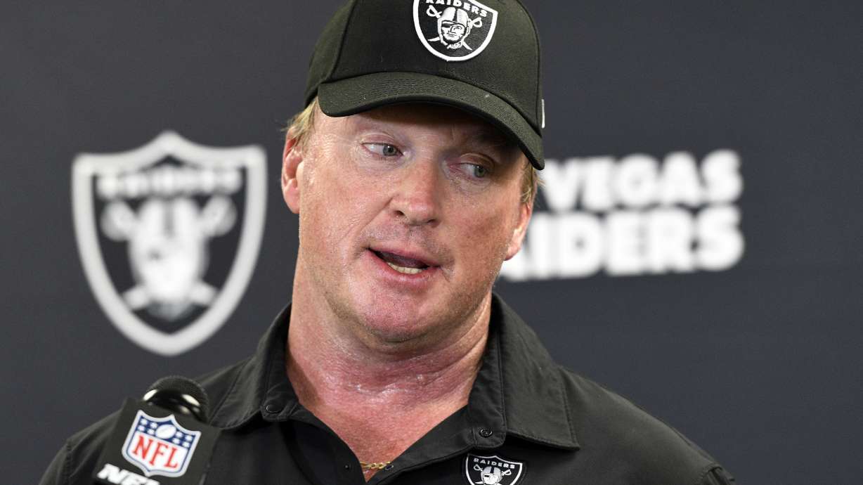 FILE - Las Vegas Raiders head coach Jon Gruden speaks with the media following an NFL football game against the Pittsburgh Steelers in Pittsburgh, Sept. 19, 2021.
