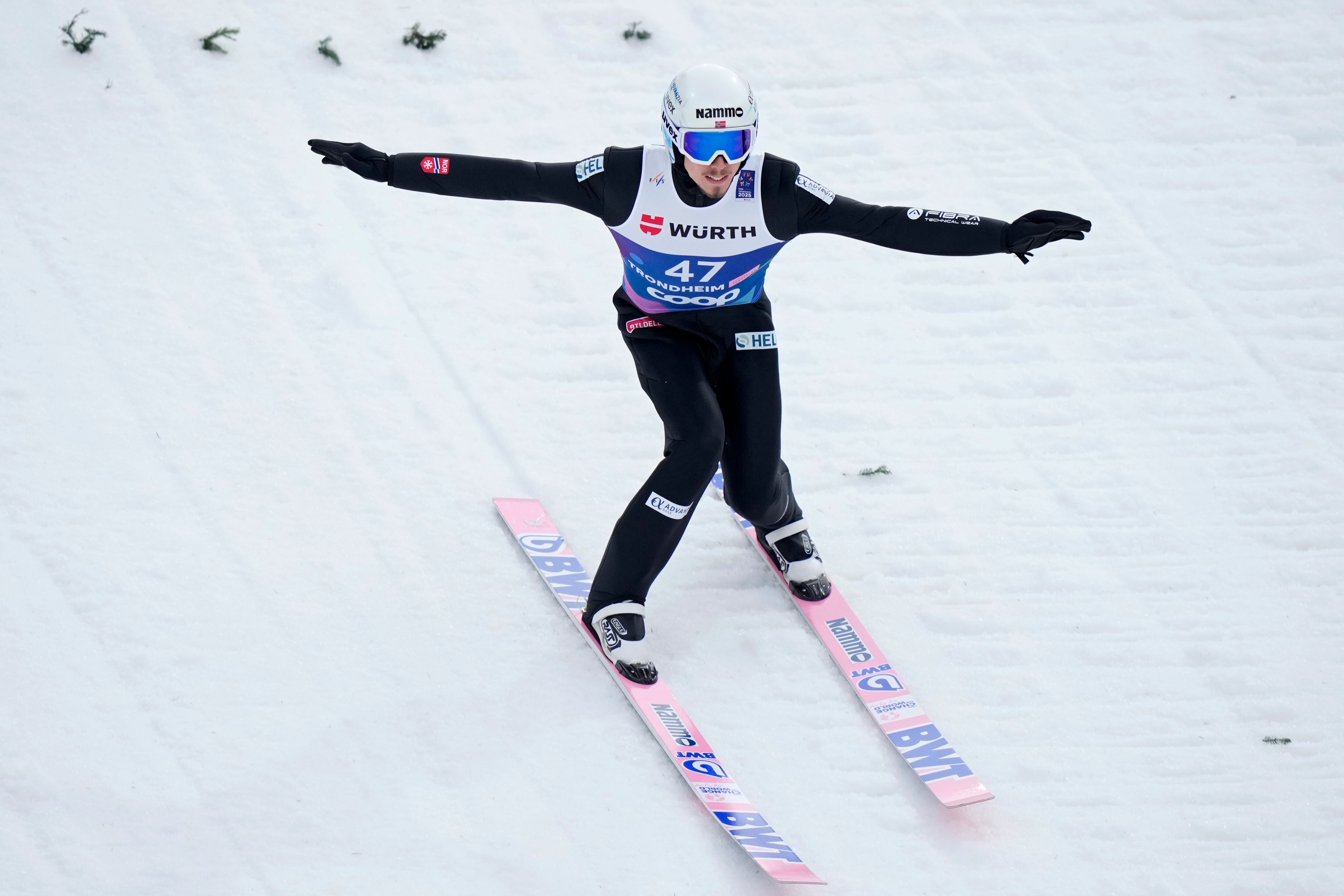 Johann Andre Forfang, of Norway, lands his first round jump of the ski jumping men's large hill individual competition at the Nordic World Ski Championships in Trondheim, Norway, March 8.