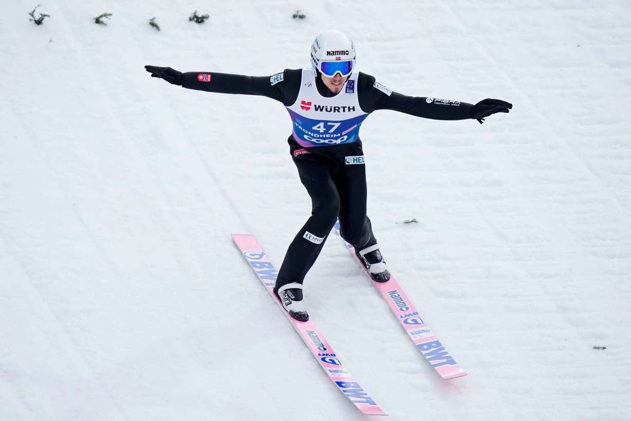 Johann Andre Forfang, of Norway, lands his first round jump of the ski jumping men's large hill individual competition at the Nordic World Ski Championships in Trondheim, Norway, March 8.