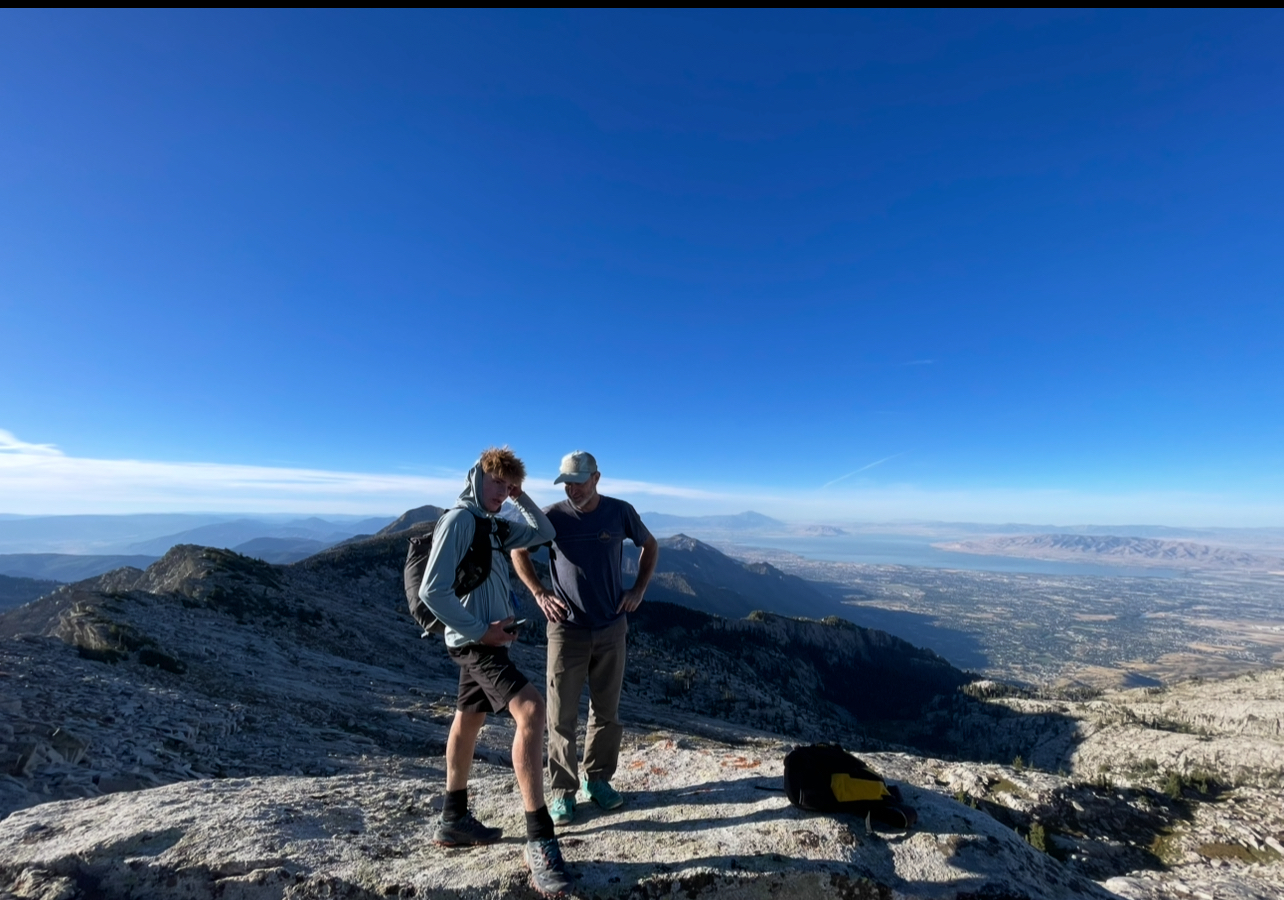 Jesse Zurinkas and his father Chad Zurinkas during the 35-hour hike across the Wasatch Ultimate Ridge Linkup trail. Various companions joined Jesse on his hike to help him stay safe.