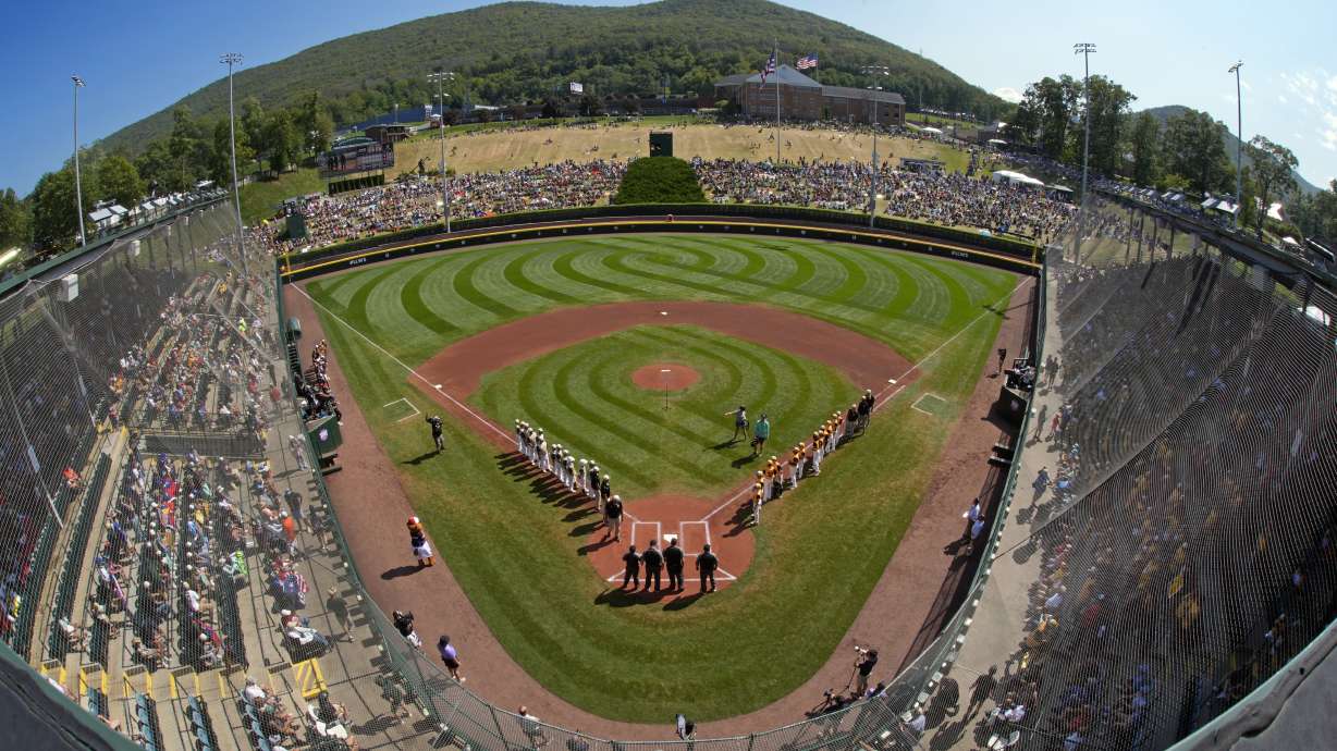 FILE - Taiwan lines the third baseline as Lake Mary, Fla., lines the first baseline during team introductions before the Little League World Series Championship game at Lamade Stadium in South Williamsport, Pa., Sunday, Aug. 25, 2024.