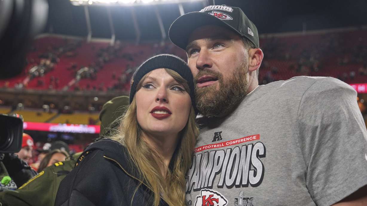FILE - Kansas City Chiefs tight end Travis Kelce, right, appears with singer Taylor Swift after the Chiefs victory over the Buffalo Bills in the AFC Championship game in Kansas City, Mo., on Jan. 26, 2025.