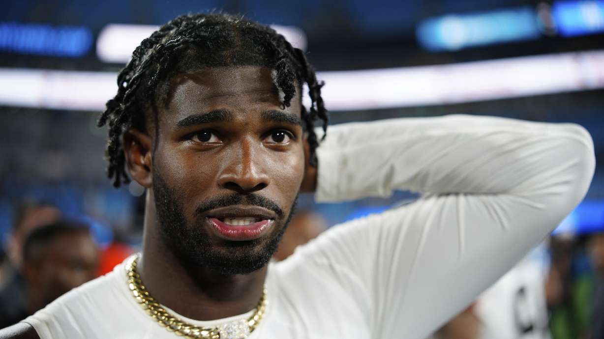 Cleveland Browns quarterback Shedeur Sanders walks of the field after a preseason NFL football game against the Carolina Panthers on Friday, Aug. 8, 2025, in Charlotte, N.C.