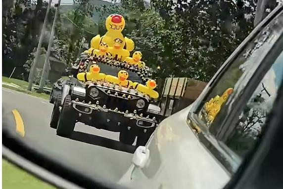 A Jeep trails a vehicle in Johnson City, Tennessee, in June.
