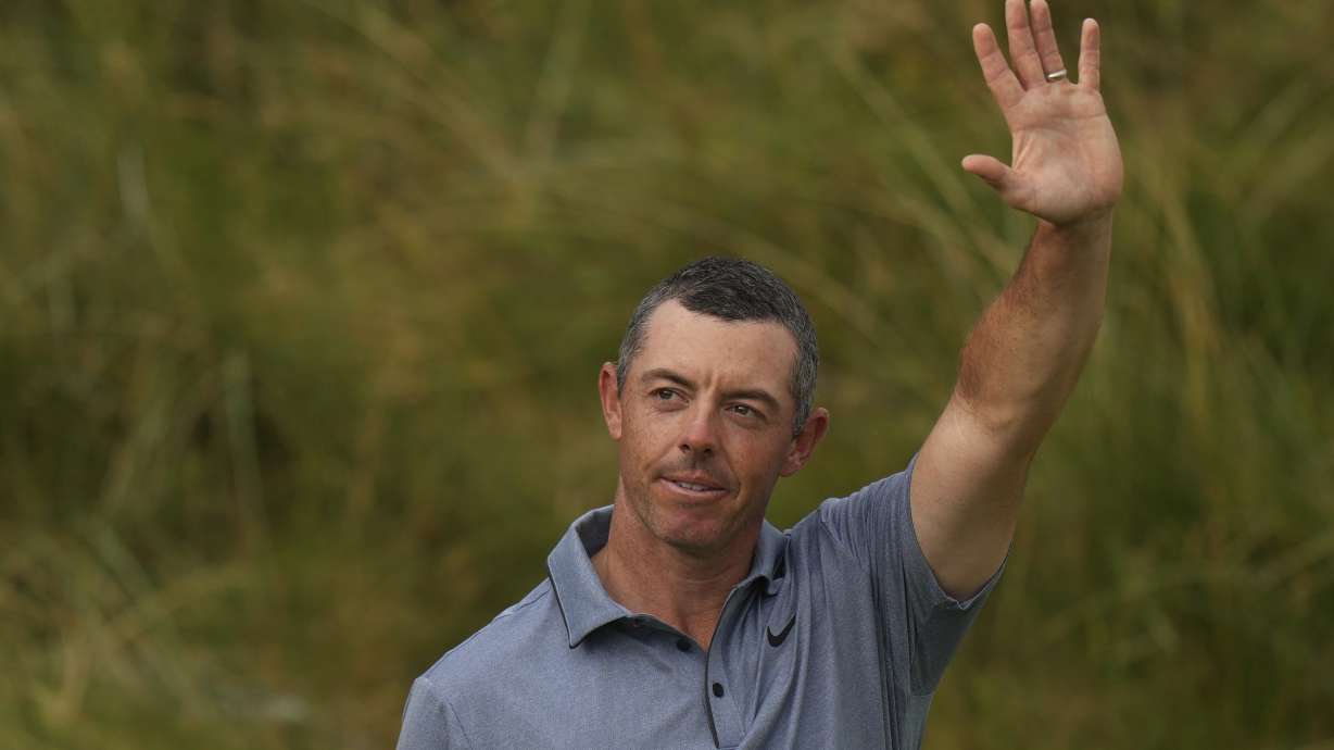 Rory McIlroy of Northern Ireland acknowledges the crowd as he walks onto the 18th green during the final round of the British Open golf championship at the Royal Portrush Golf Club, Northern Ireland, Sunday, July 20, 2025.