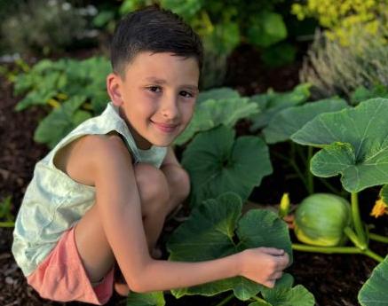 Joshua Armstrong, 9, has tried to find gardening space anywhere he can in his yard in Riverton. Casey Armstrong, Joshua's dad, hopes to get him a plot of land in a community garden one day.