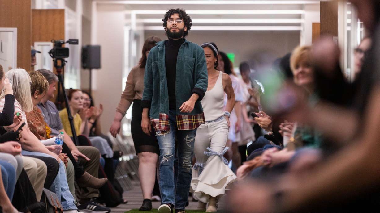 SLCC Fashion Institute students walk the runway in their recycled, repurposed clothing on April 22, 2024. Fashion shows are becoming more popular as a fundraiser, as people donate and have fun at the same time.