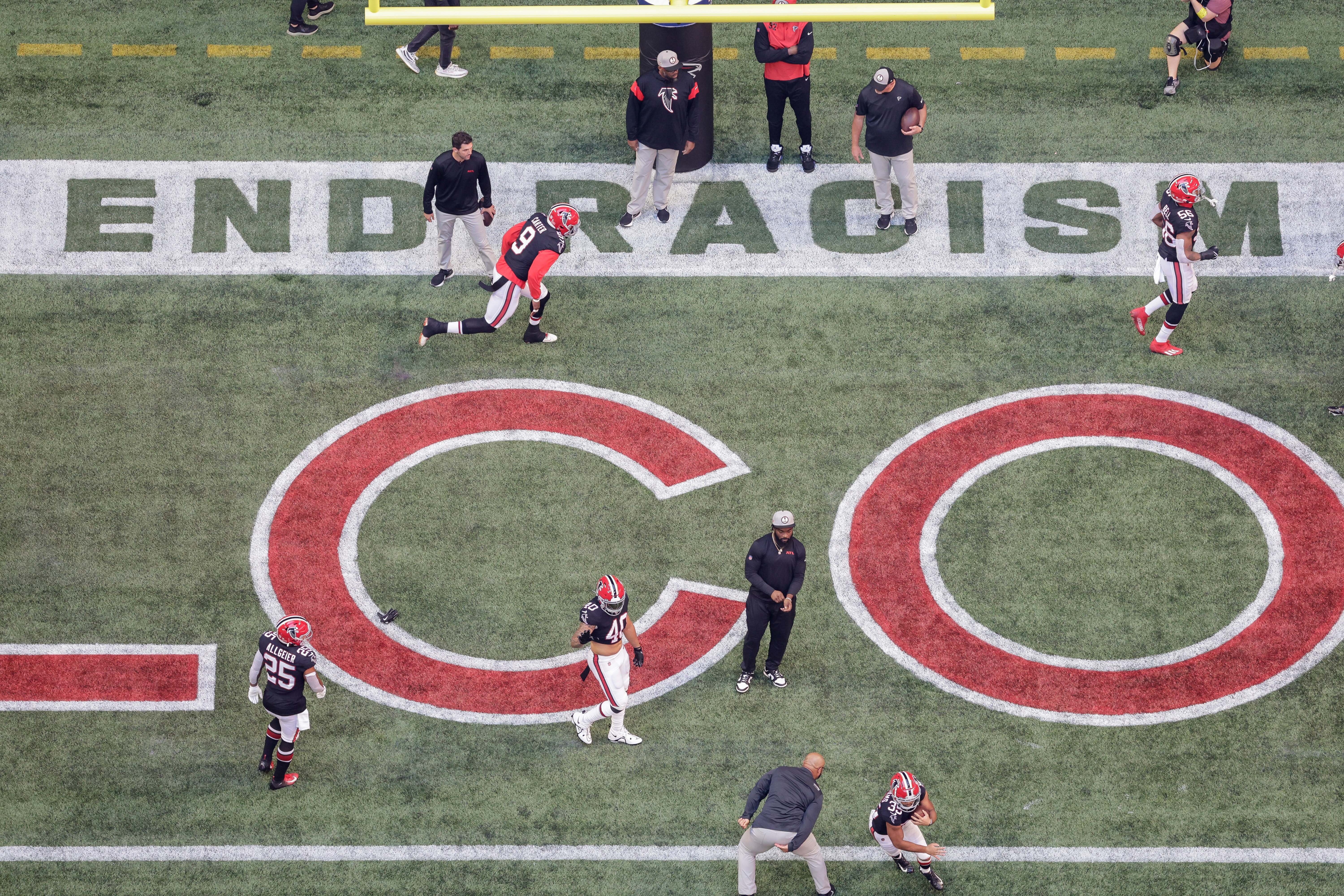 FILE - The Atlanta Falcons warm up in the endzone prior to an NFL football game against the San Francisco 49ers, Oct. 16, 2022, in Atlanta.
