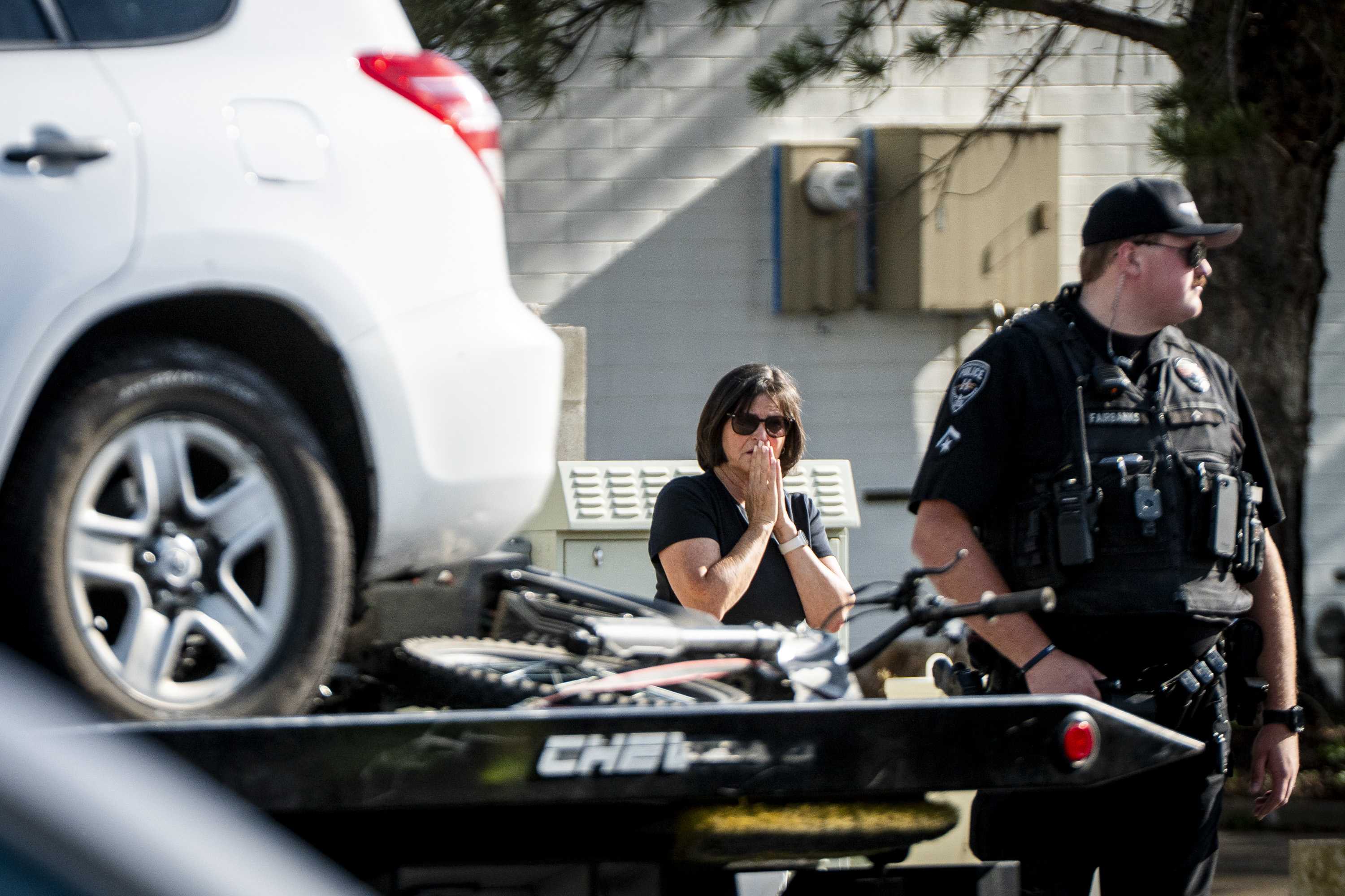 An electric bike is secured on a tow truck as authorities respond to a fatal e-bike incident near the intersection of 1300 West and 12600 South in Riverton on Aug. 14. Christian Harrison Beckner, 45, was charged Friday with manslaughter in the death.