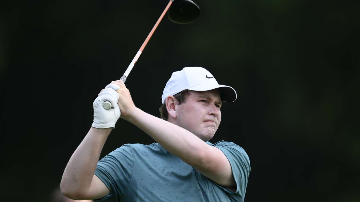 Robert MacIntyre, of Scotland, hits from the ninth tee during the first round of the BMW Championship golf tournament Thursday, Aug. 14, 2025, in Owings Mills, Md.
