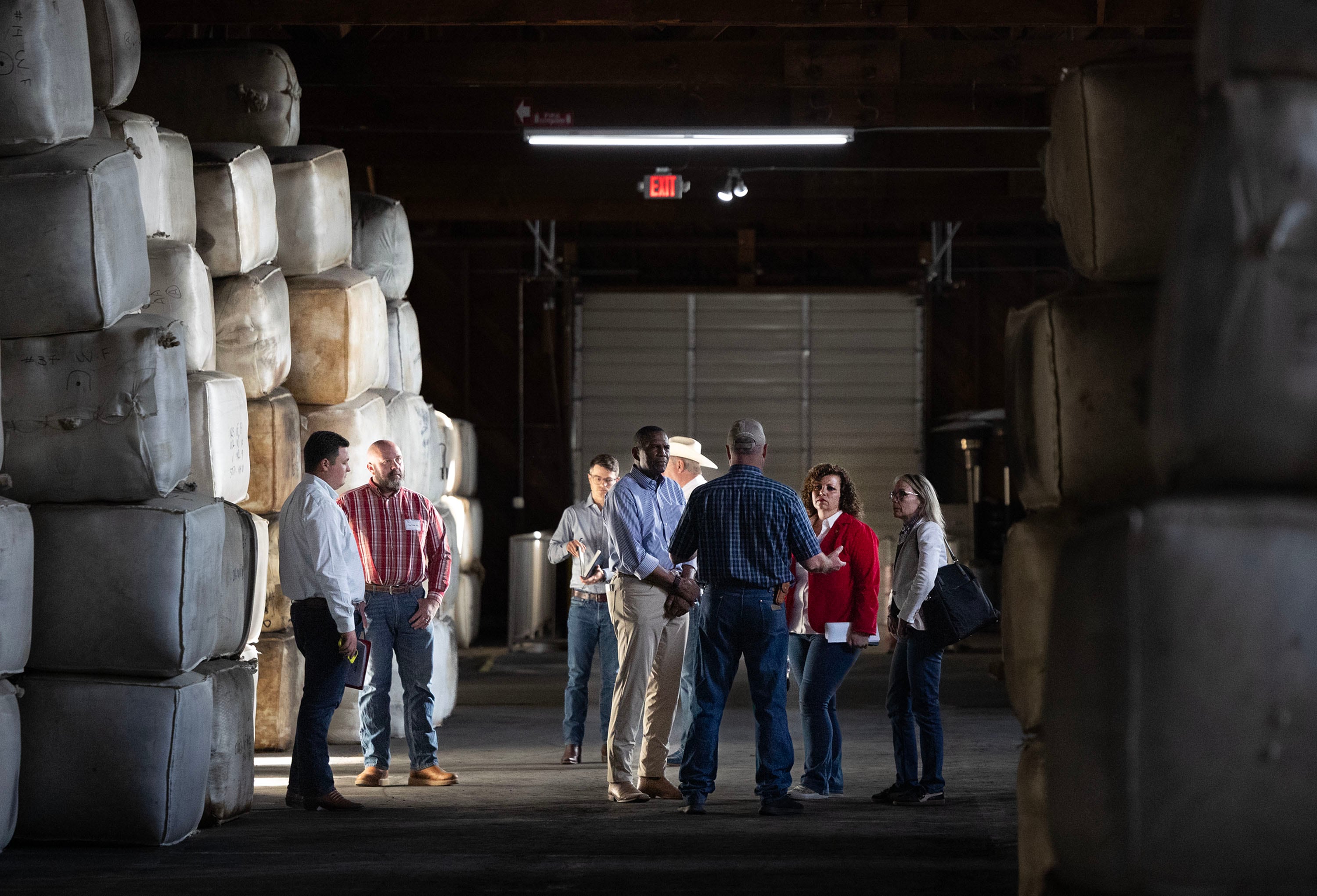 Rep. Celeste Maloy, Julie Callahan and Rep. Burgess Owens tour the Utah Wool Marketing Association in Tooele on Thursday. The visit comes as a push to revitalize Utah's sheep industry continues.