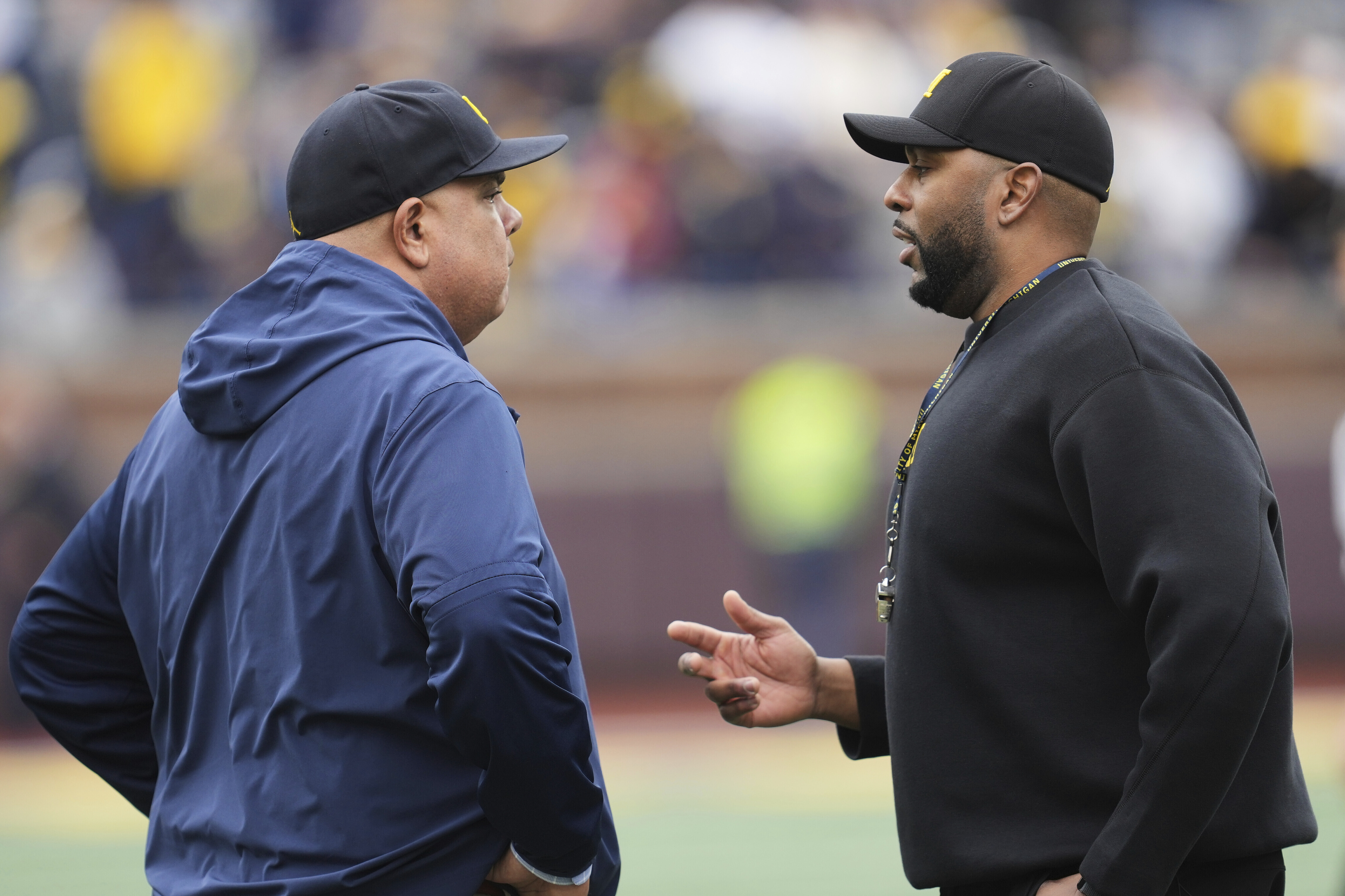 NCAA fines Michigan millions, adds game suspension for Moore over sign-stealing scandal