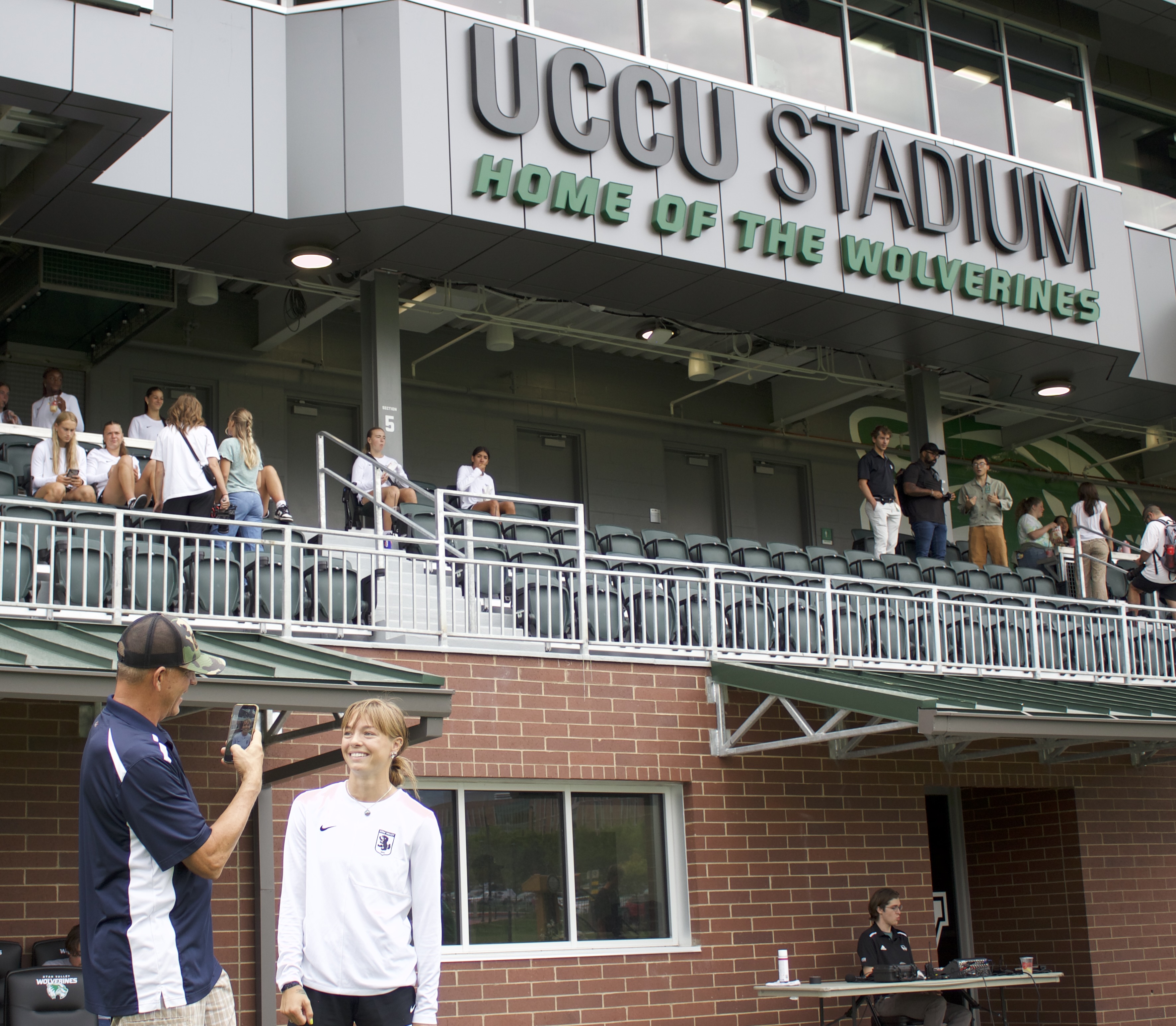 Utah Valley forward Faith Webber films a video during the $28.5 million UCCU Stadium's ribbon-cutting ceremony, Friday, Aug. 15, 2025 in Orem, Utah.