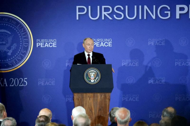 Russian President Vladimir Putin speaks at a press conference at Joint Base Elmendorf-Richardson in Anchorage, Alaska, on Friday. President Donald Trump said his summit with Putin was "very productive," though no deal on the war in Ukraine was reached.