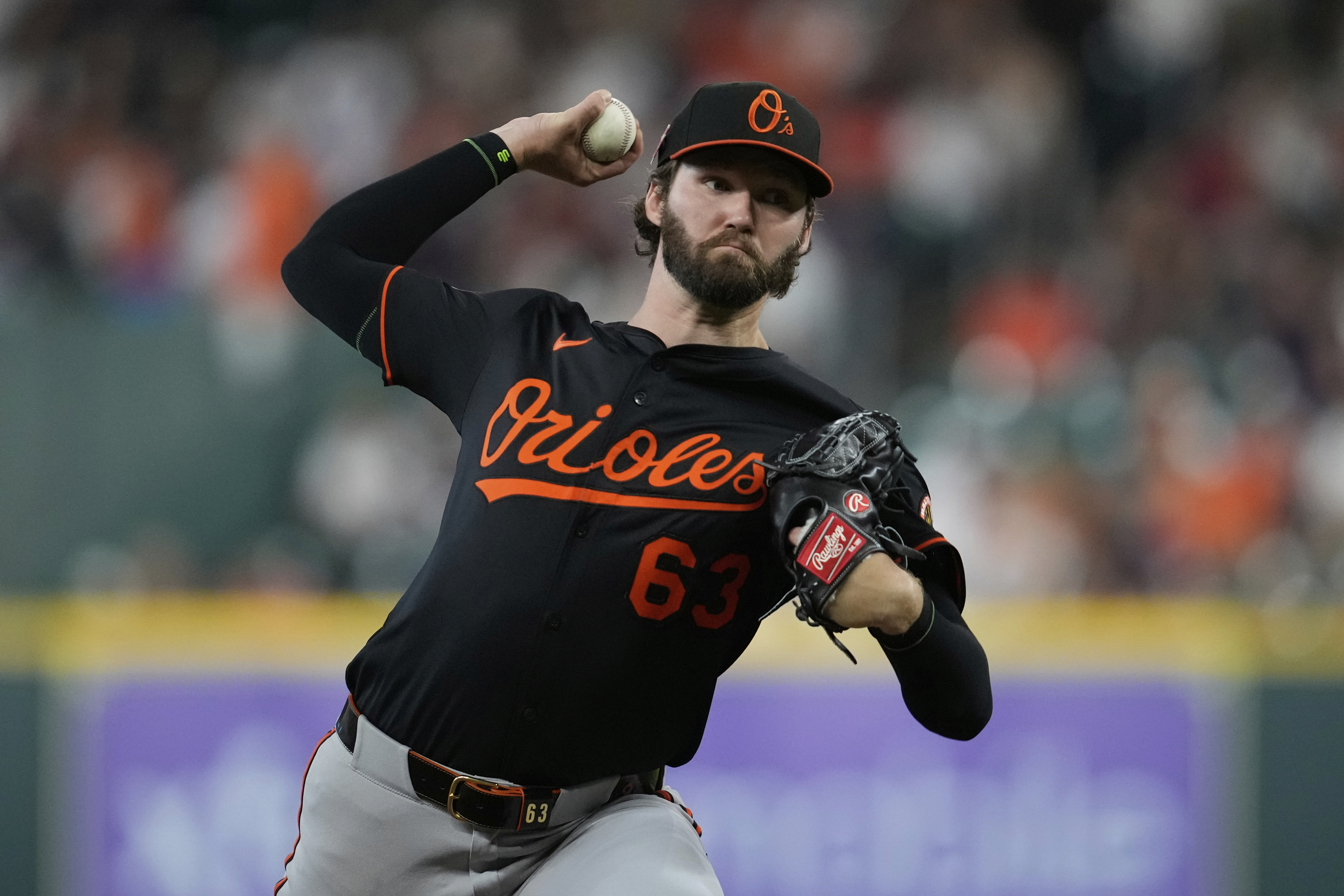 Baltimore Orioles starting pitcher Brandon Young throws during the first inning of a baseball game against the Houston Astros in Houston, Friday, Aug. 15, 2025.
