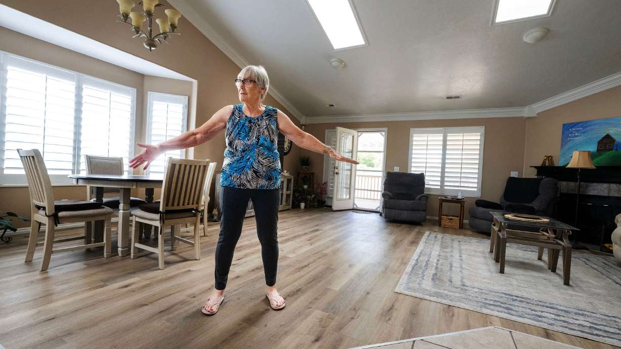 Ingrid Penn, who would like to sell her home if she could find the right situation and location, shows her home and discusses her hopes while in Taylorsville on Aug. 11.