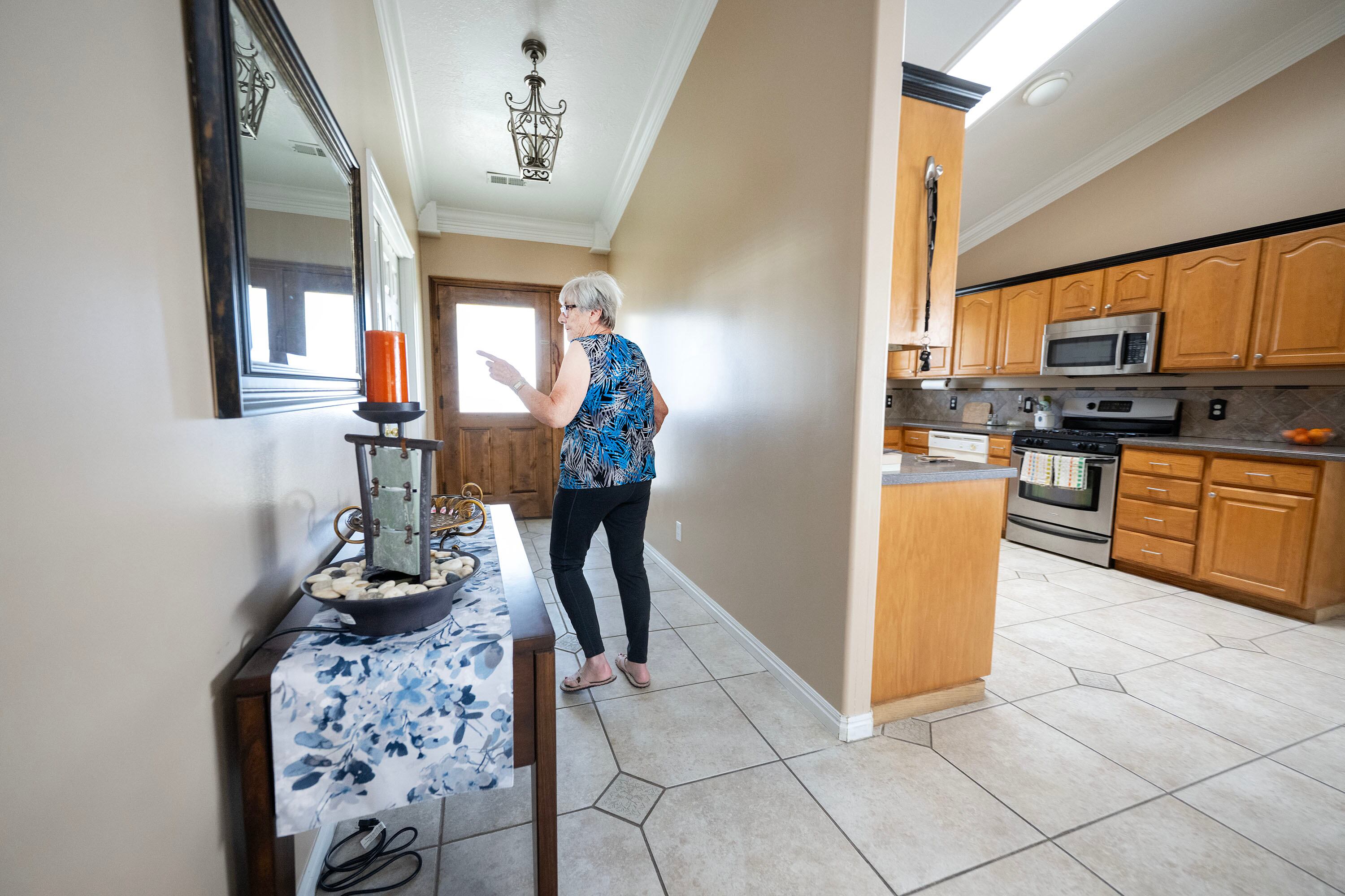Ingrid Penn, who would like to sell her home if she could find the right situation and location, shows her home and discusses her hopes while in Taylorsville on Aug. 11.