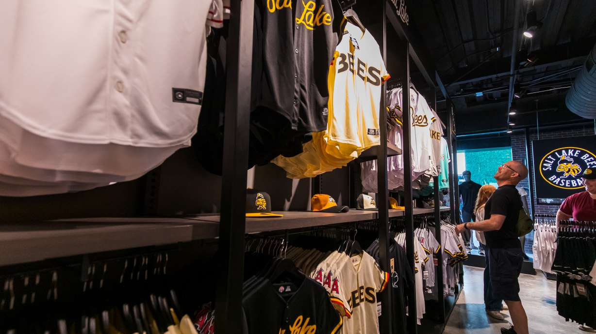 Fans explore jersey options at the Salt Lake Bees Team Store at America First Square in South Jordan on July 24.