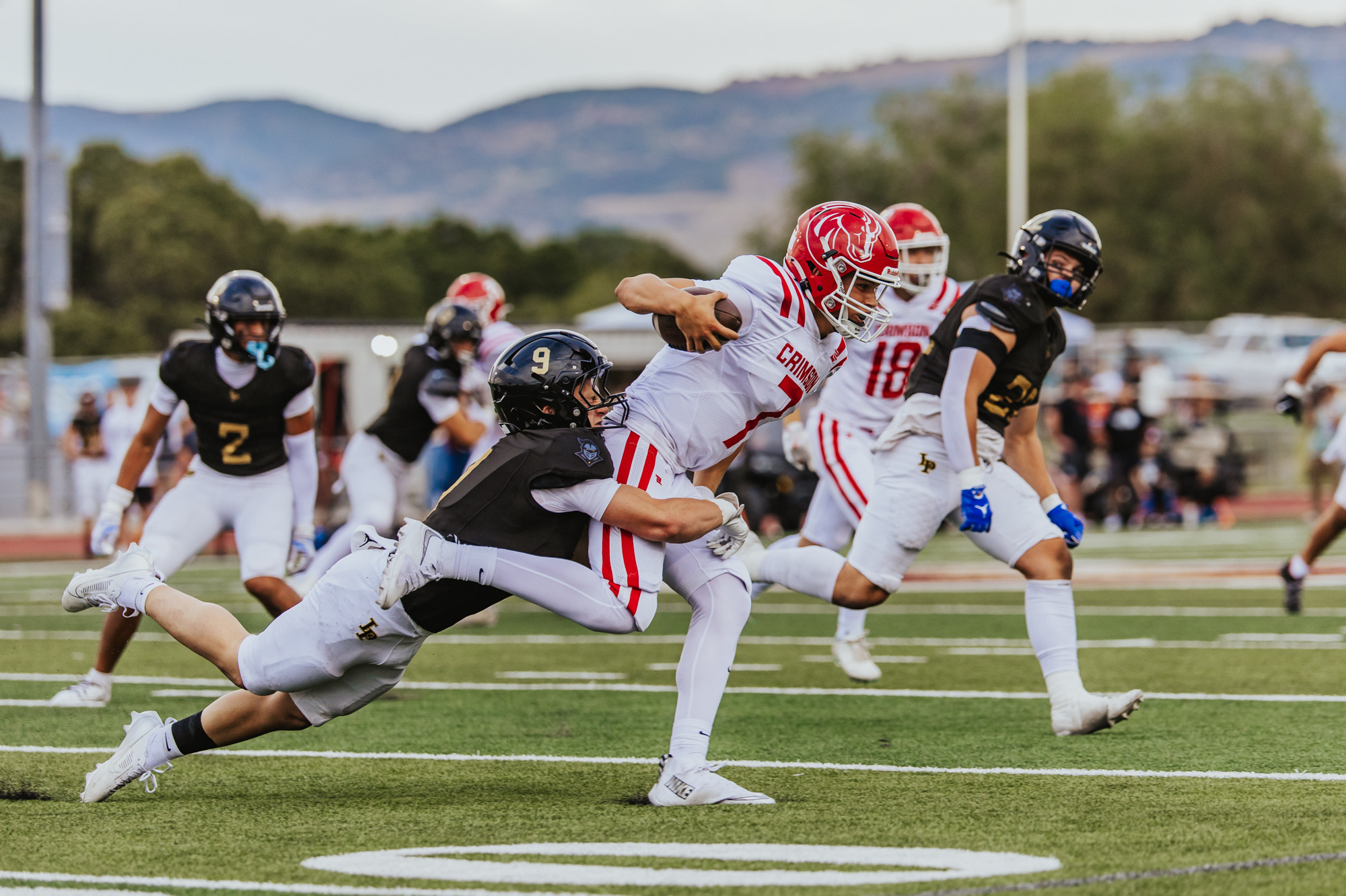 Lone Peak's Anthon Grimmer makes a tackle during the Knights' 2025 high school football season opener against Crimson Cliffs, Friday, Aug. 15, 2025 in Highland, Utah.