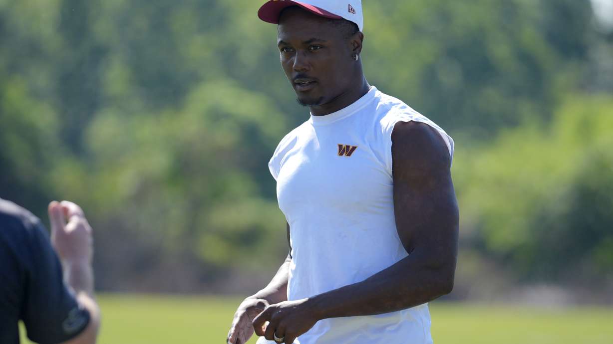 Washington Commanders wide receiver Terry McLaurin walks across the field after a practice at the team's NFL football training camp, Sunday, July 27, 2025, in Ashburn, Va.