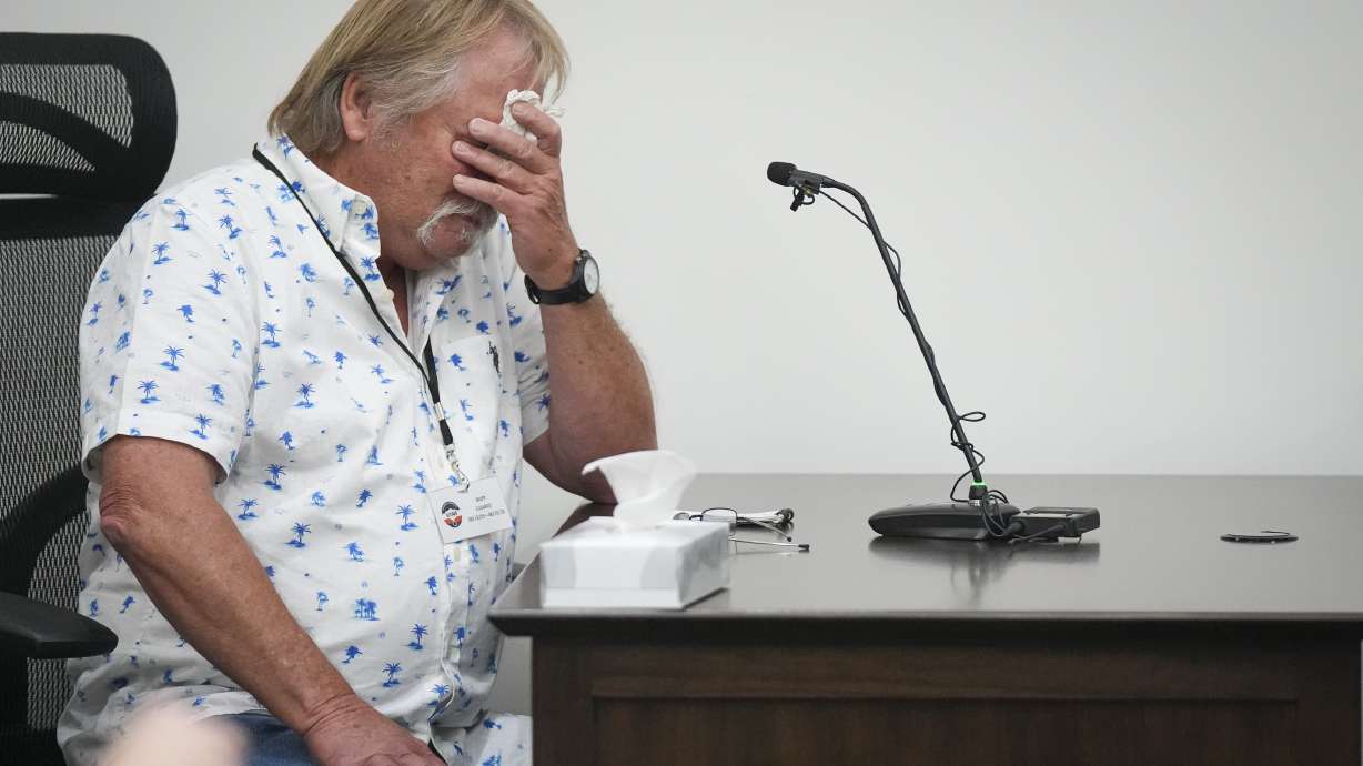 Jim Hunsaker, the husband of Maurine Hunsaker, becomes emotional as he speaks during the commutation hearing for Ralph Menzies, the man convicted of Hunsaker’s murder, at the Utah State Correctional Facility in Salt Lake City on Friday.