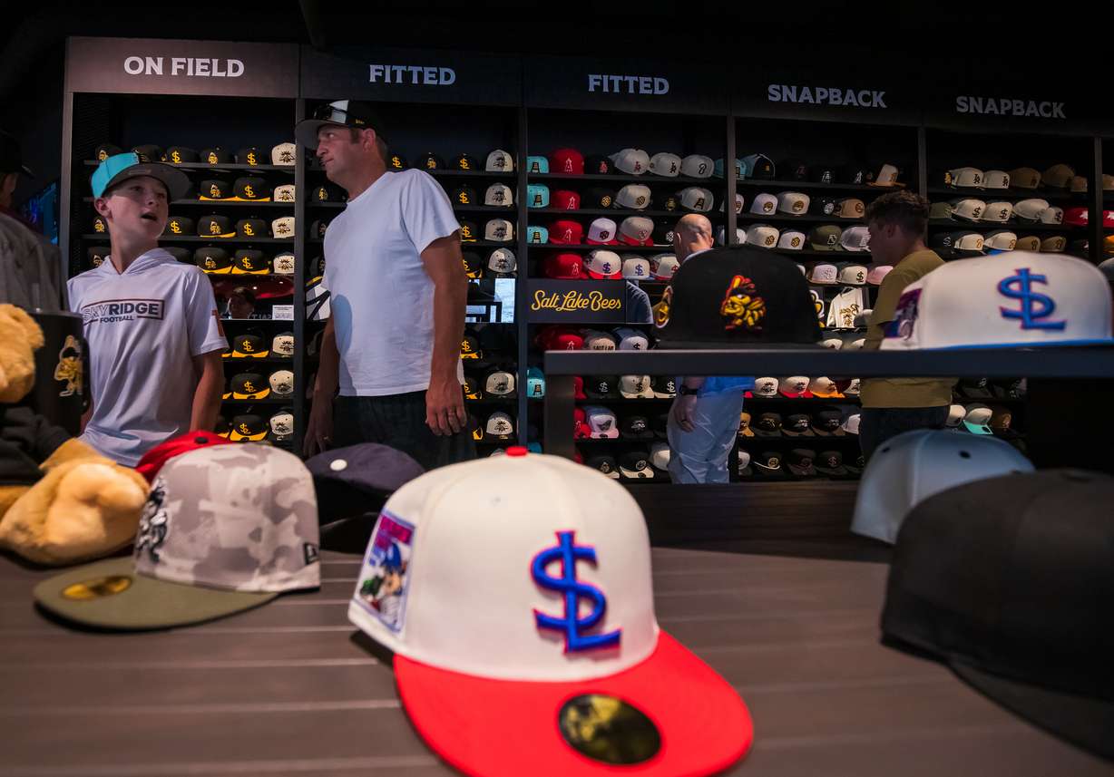 Fans explore hat options at the Salt Lake Bees Team Store at America First Square in South Jordan on July 24.