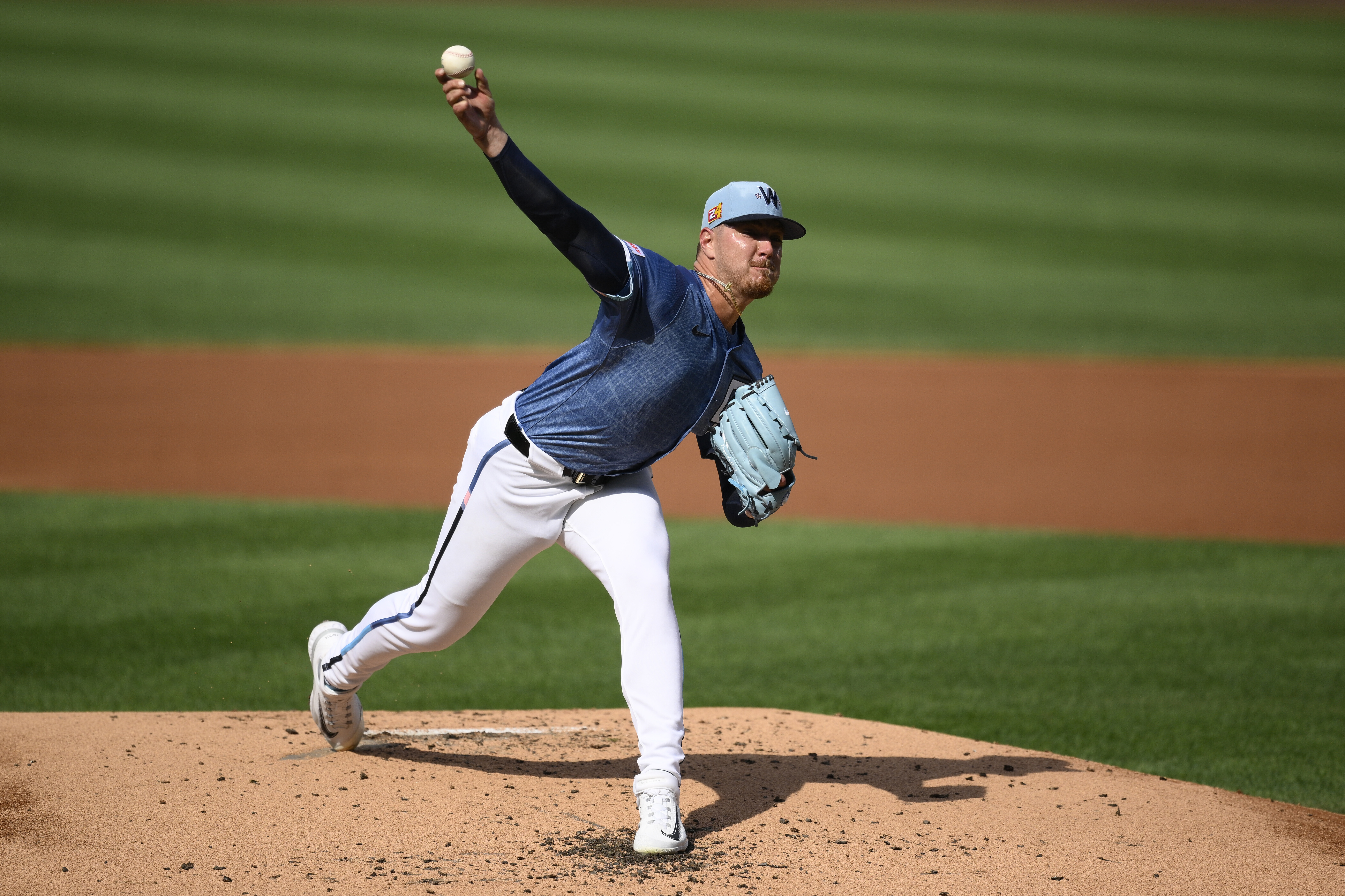 Washington Nationals starting pitcher Cade Cavalli throws during the second inning of a baseball game against the Philadelphia Phillies, Saturday, Aug. 16, 2025, in Washington.