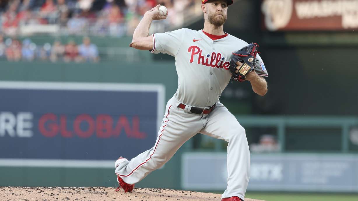 Philadelphia Phillies pitcher Zack Wheeler throws during the first inning of a baseball game against the Washington Nationals, Friday, Aug. 15, 2025, in Washington.