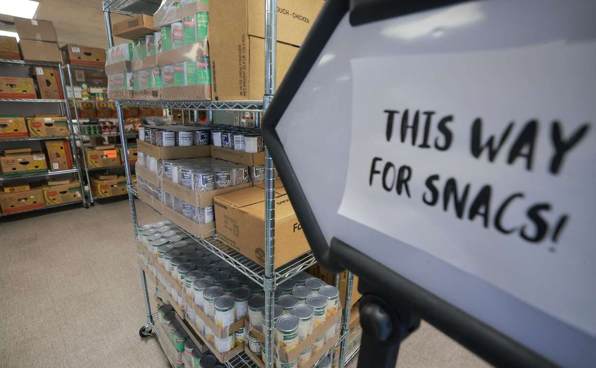 Food sits on the shelves of the Student Nutrition Access Center, or SNAC, food pantry at Utah State University in Logan on Aug. 11.