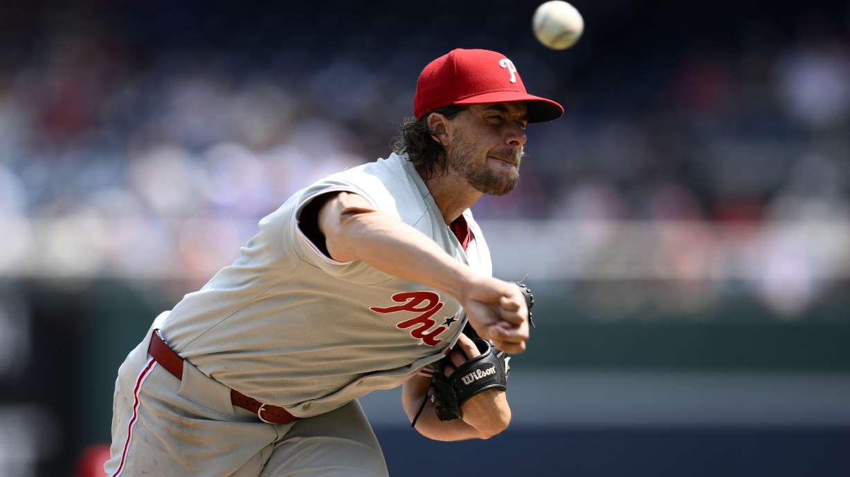 Philadelphia Phillies starting pitcher Aaron Nola throws during the first inning of a baseball game against the Washington Nationals, Sunday, Aug. 17, 2025, in Washington.