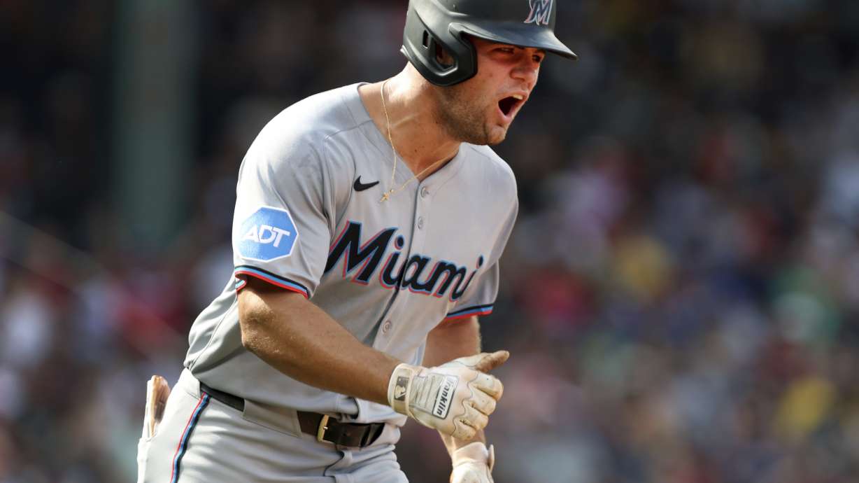 Miami Marlins' Jakob Marsee reacts after hitting a two-run home run in the ninth inning of a baseball game against the Boston Red Sox, Sunday, Aug. 17, 2025, in Boston.